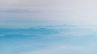 mountain covering with clouds